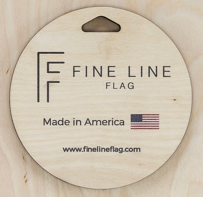 back hanger cut out with text made in America and Fine Line Flag