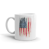 grunge print of American flag on white coffee mug