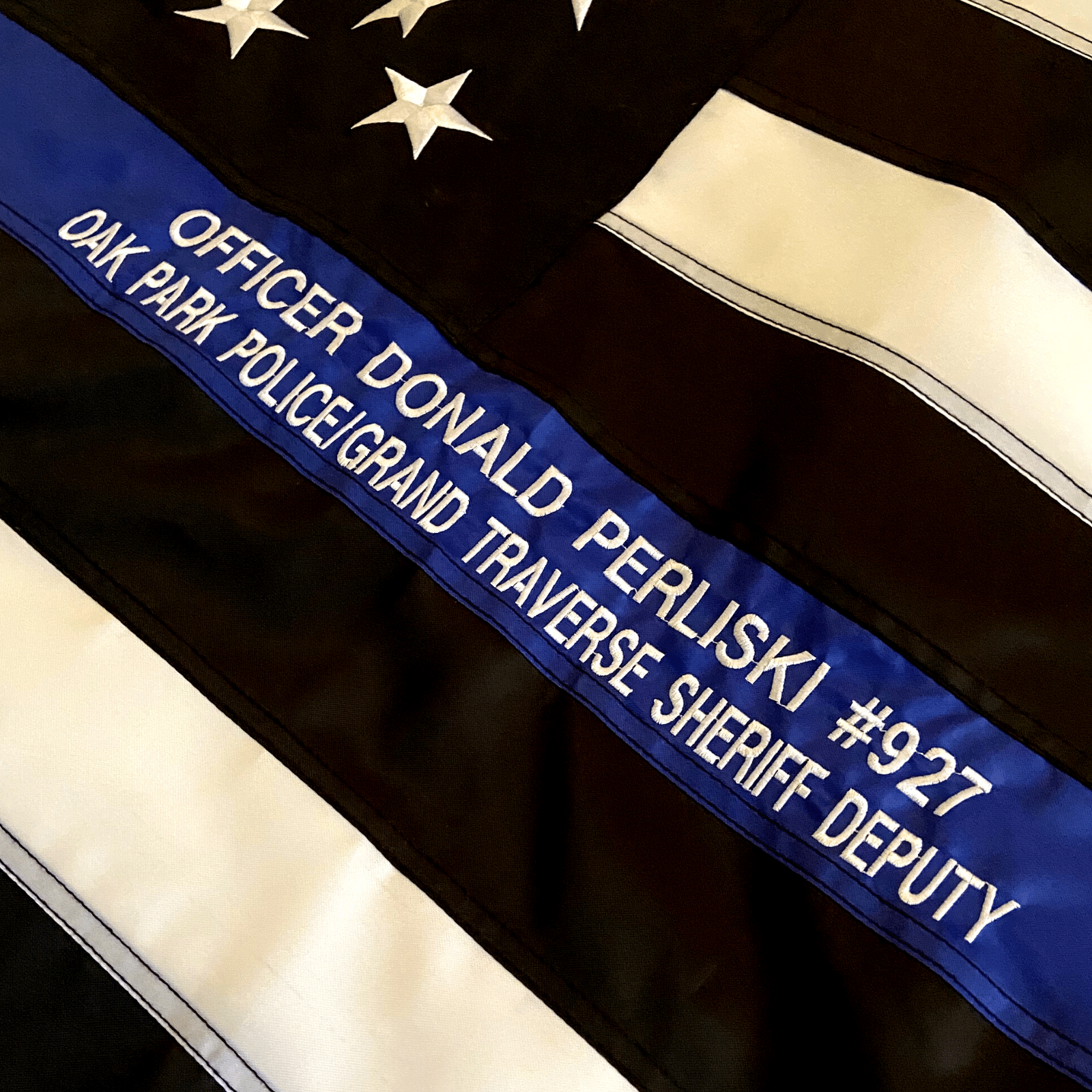Custom Embroidery on Thin Blue Line Police Flag Officer Name and Badge