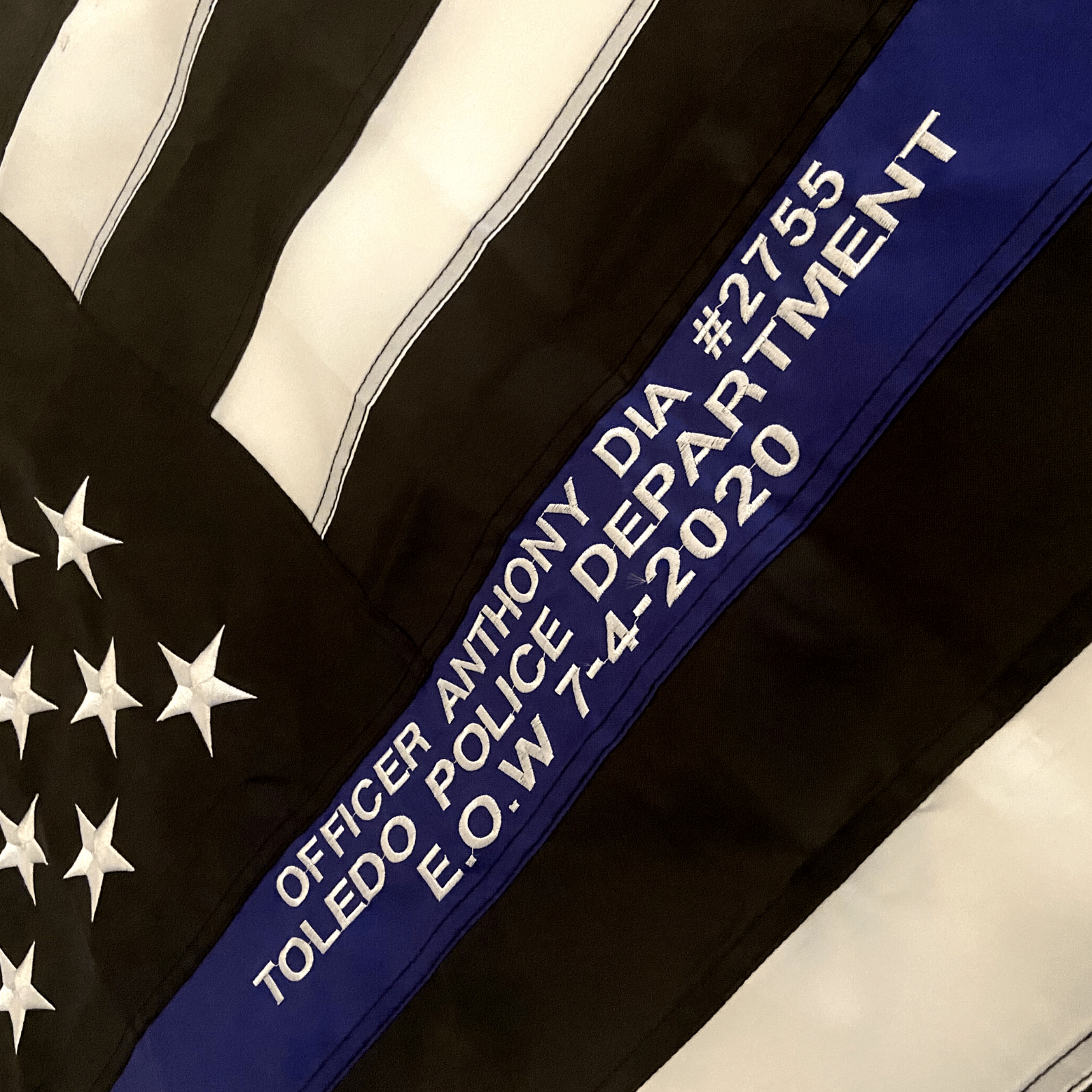 thin Blue Line police flag with custom embroidery officer name and badge
