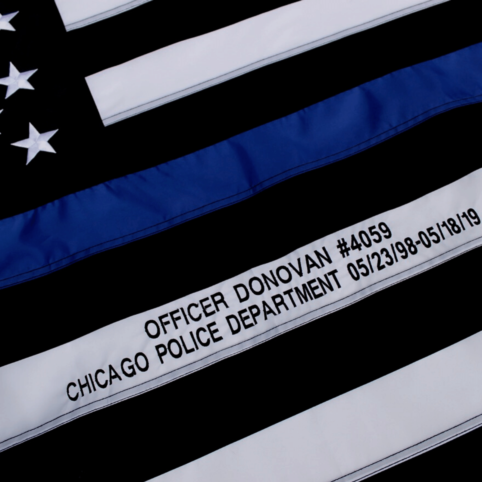 Custom Embroidery on Thin Blue Line Police Flag Officer Name and Badge