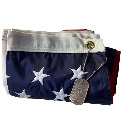 American Flag folded with dog tag 2.5x4