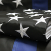 Embroidered stars Thin blue Line Flag close up of folded police flag