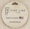 close up of built in hanger for wall display says mad in America by fine Line Flag