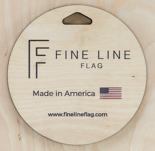 back hanger cut out with text made in America and Fine Line Flag