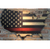 Thin Red Line print American flag on US wooden map on brick wall  