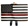 woman holding thin red line flag open